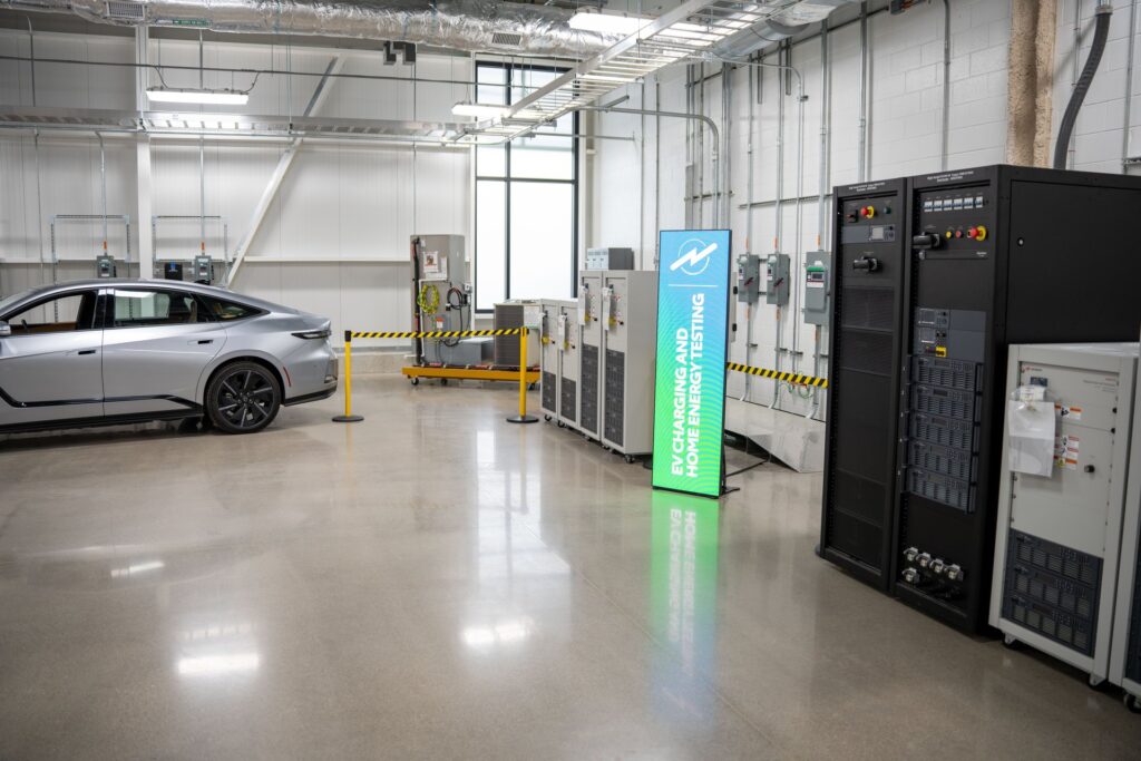 Emerging technology lab at the Toyota Battery Center of North America with test equipment and a vehicle