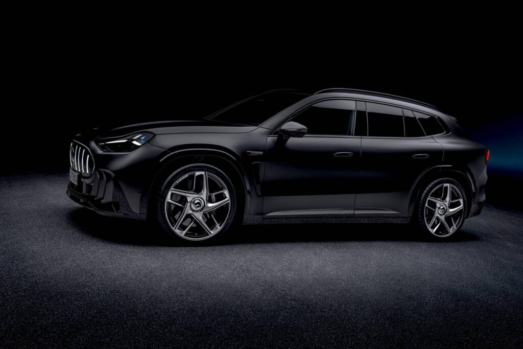 Side view of the black Mercedes-AMG GT SUV showing its low, sloping roofline