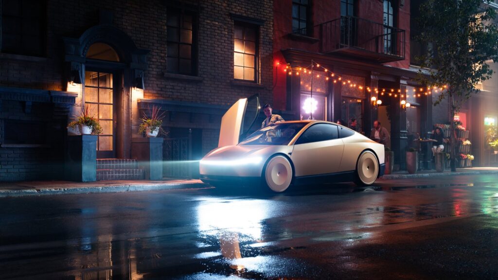 Gold Tesla Cybercab with headlights on and a door raised outside a busy restaurant at night