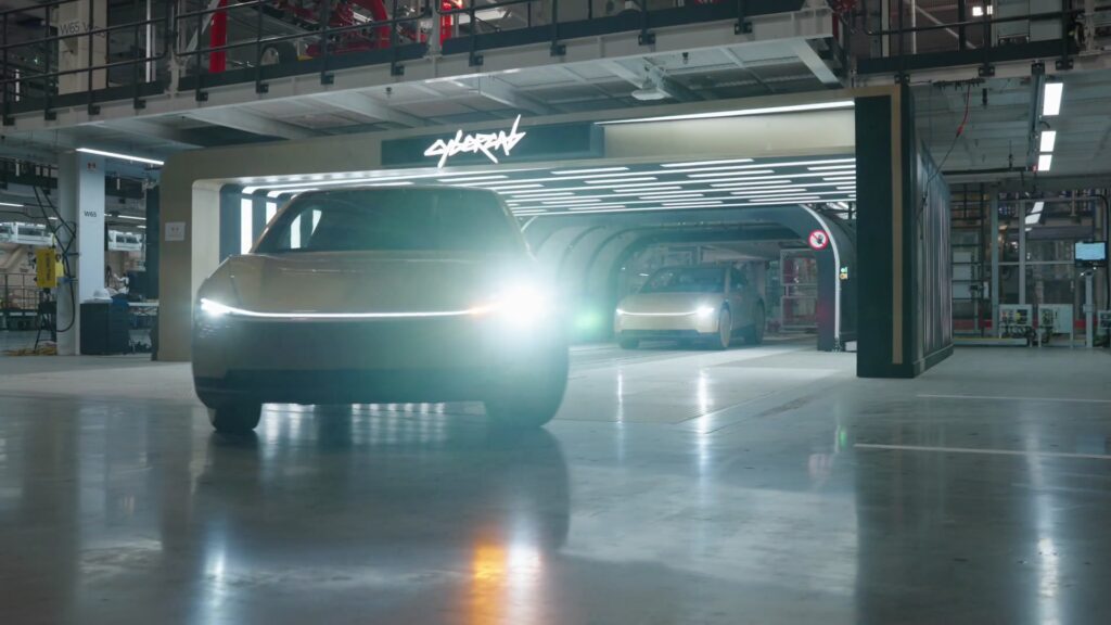 Tesla Cybercab driving out of the production line at Giga Texas
