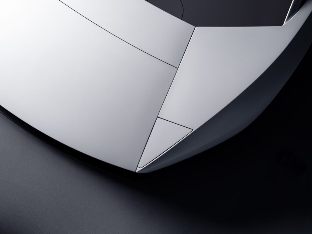 Close view of the faceted white nose of the new Tesla Roadster