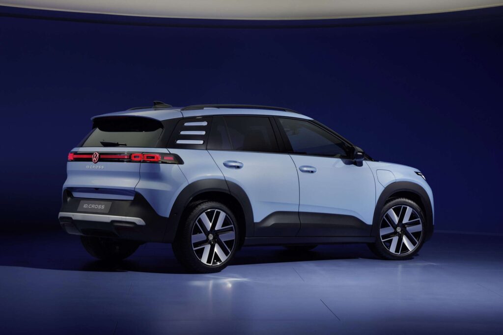 Rear three-quarter view of a light blue Volkswagen ID. Cross in a studio