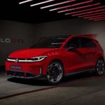 Red Volkswagen ID. Polo GTI front three-quarter view in a studio, the first all-electric GTI