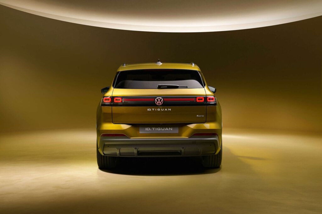 Rear view of the gold Volkswagen ID. Tiguan showing its full-width light bar
